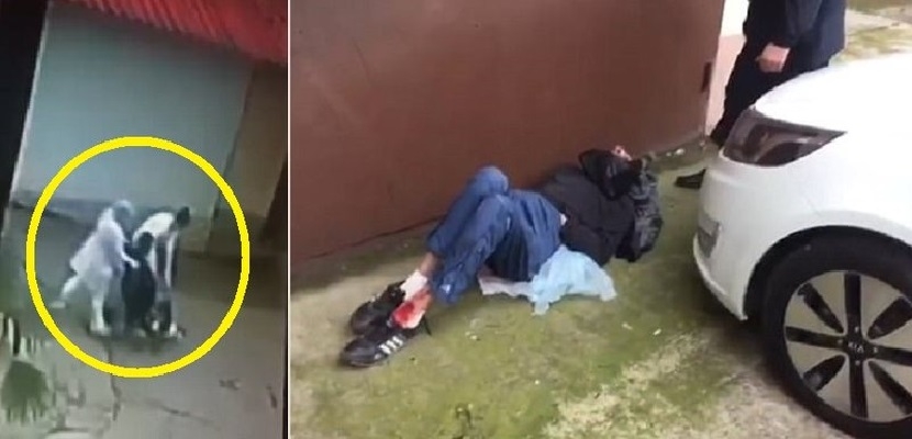 ممرضتان روسيتان يلقيان بشخص مصاب على الرصيف
